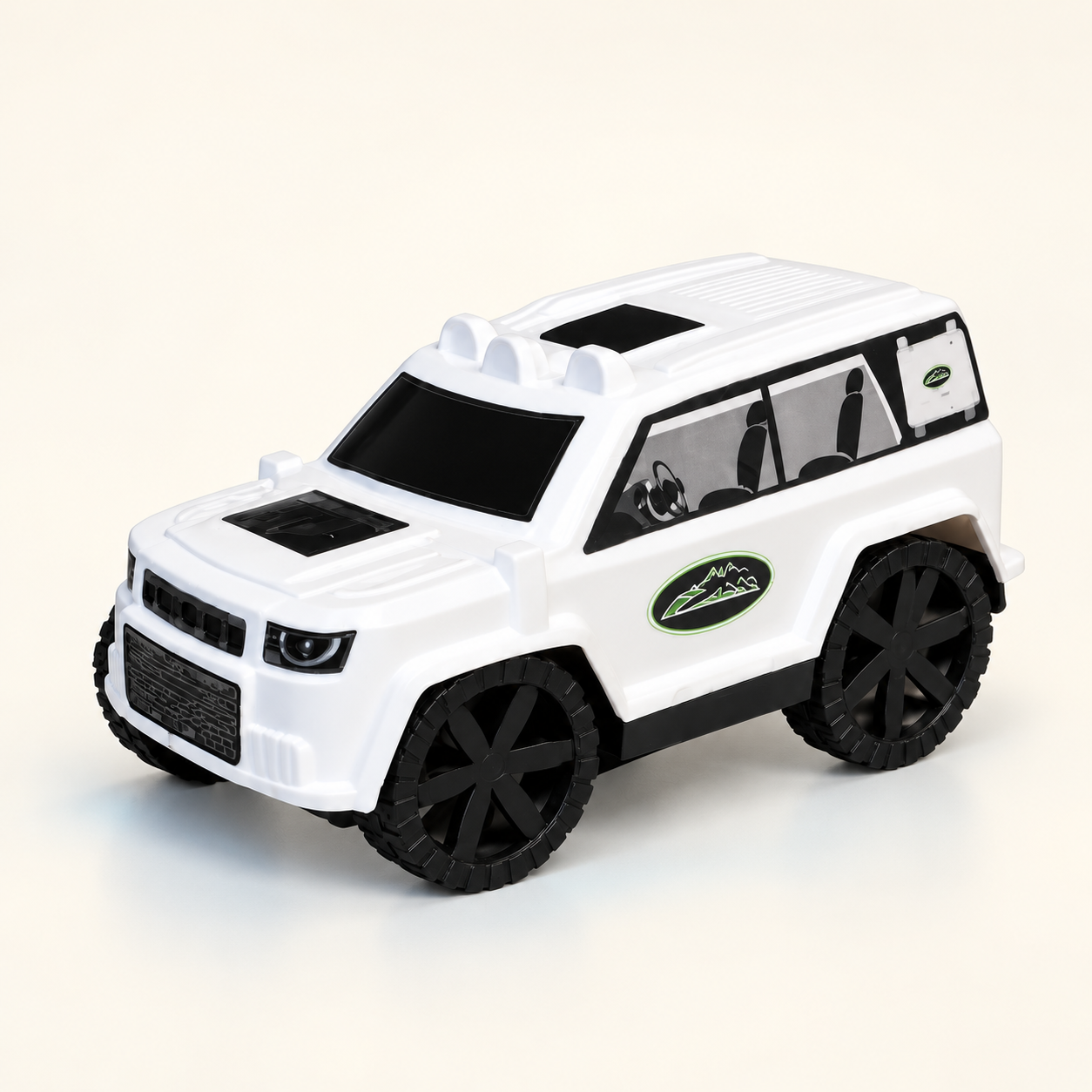 White Mini Defender toy SUV with black wheels, photographed in a warm ivory studio